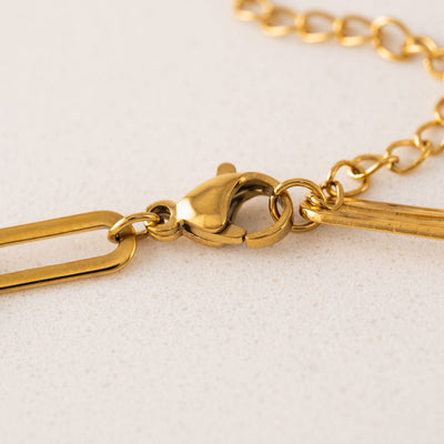 Bold paperclip necklace in gold by Lover's Tempo, close-up