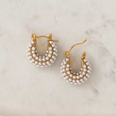 Perla pearl hoop earrings in gold by Lover's Tempo, worn